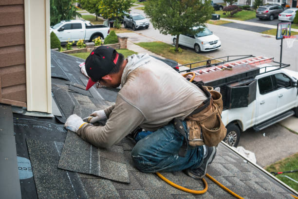Professional Roofing technician working in Essex, IL